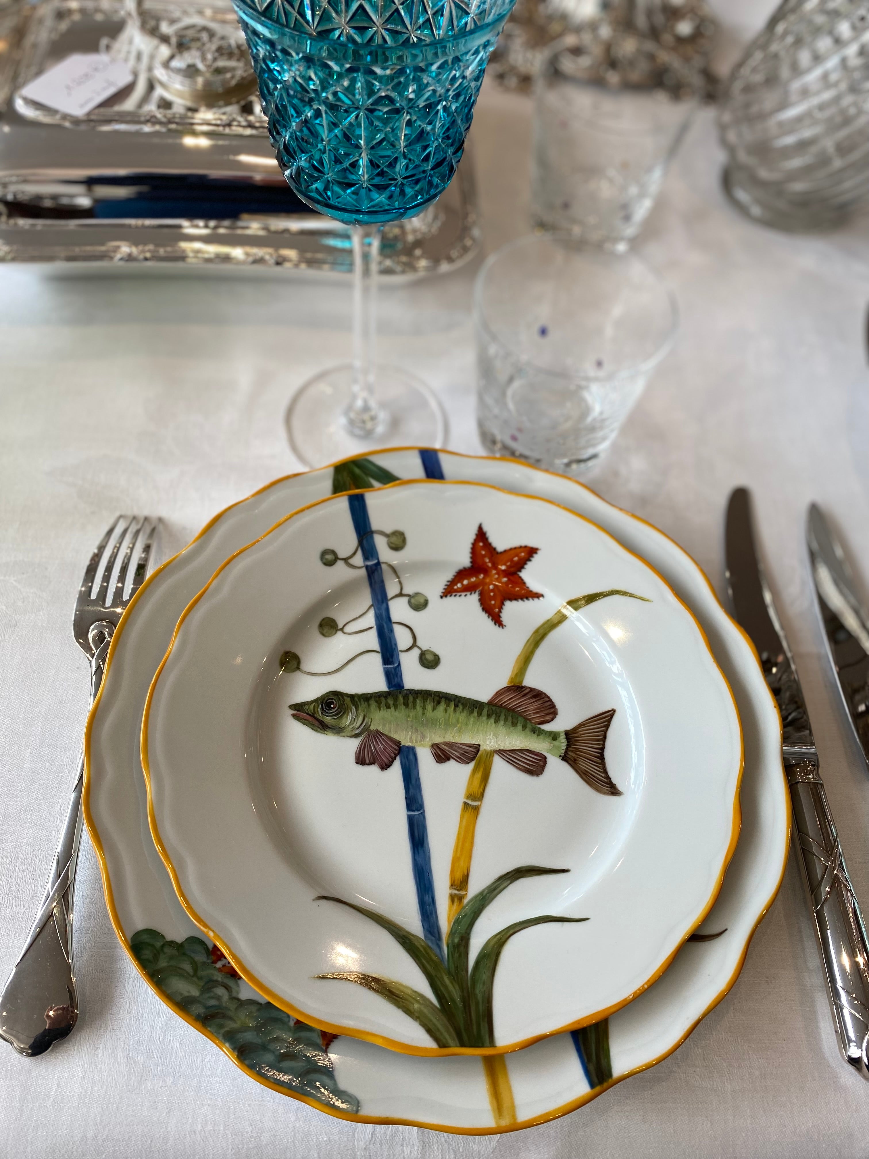 Fish painted porcelain plate