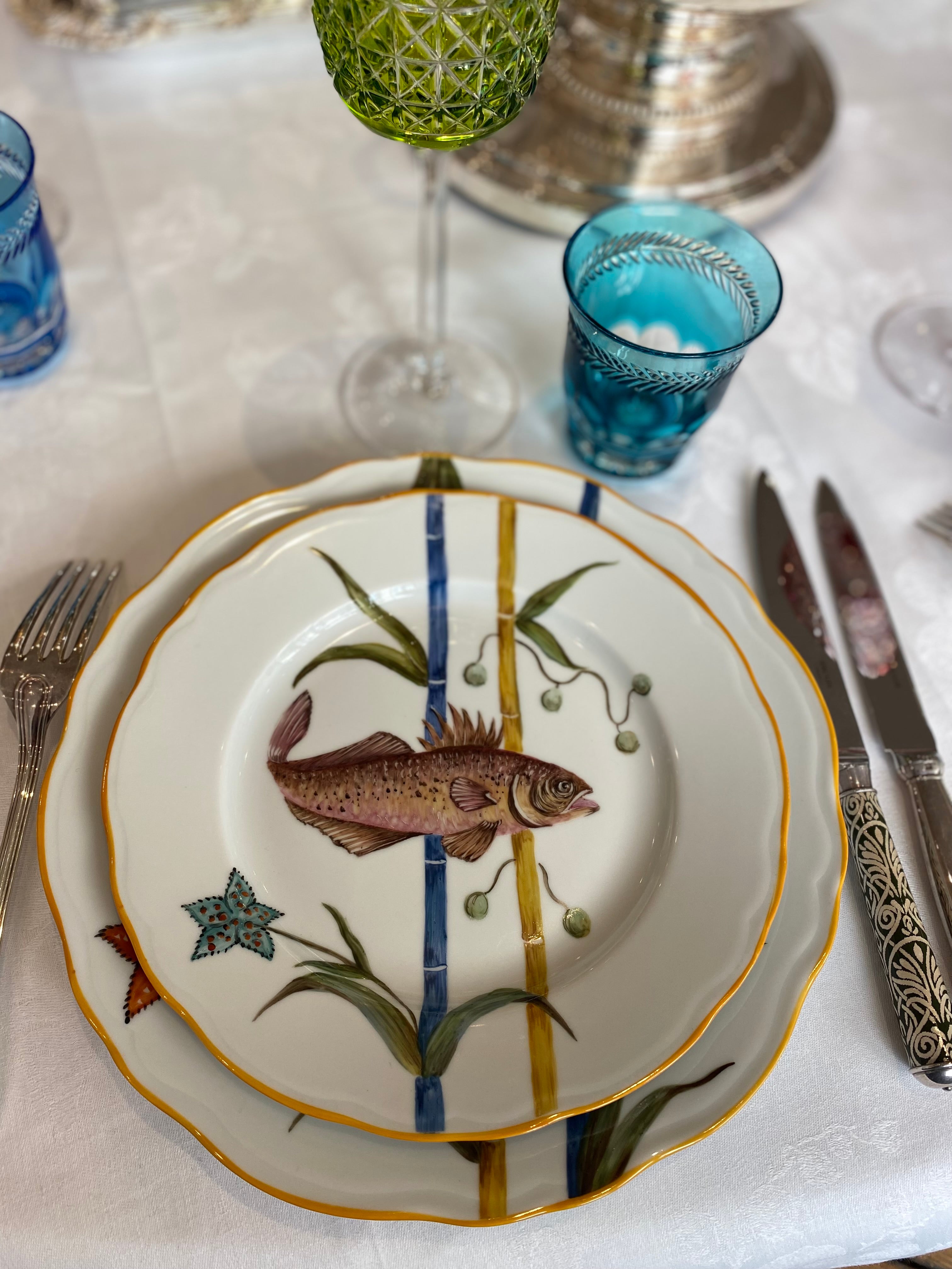 Fish painted porcelain plate